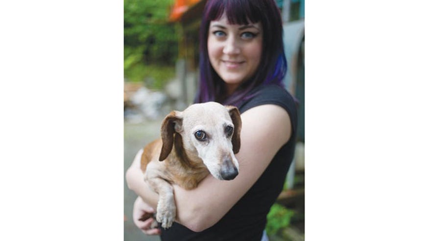 Alaska woman saves dog from bear.jpg